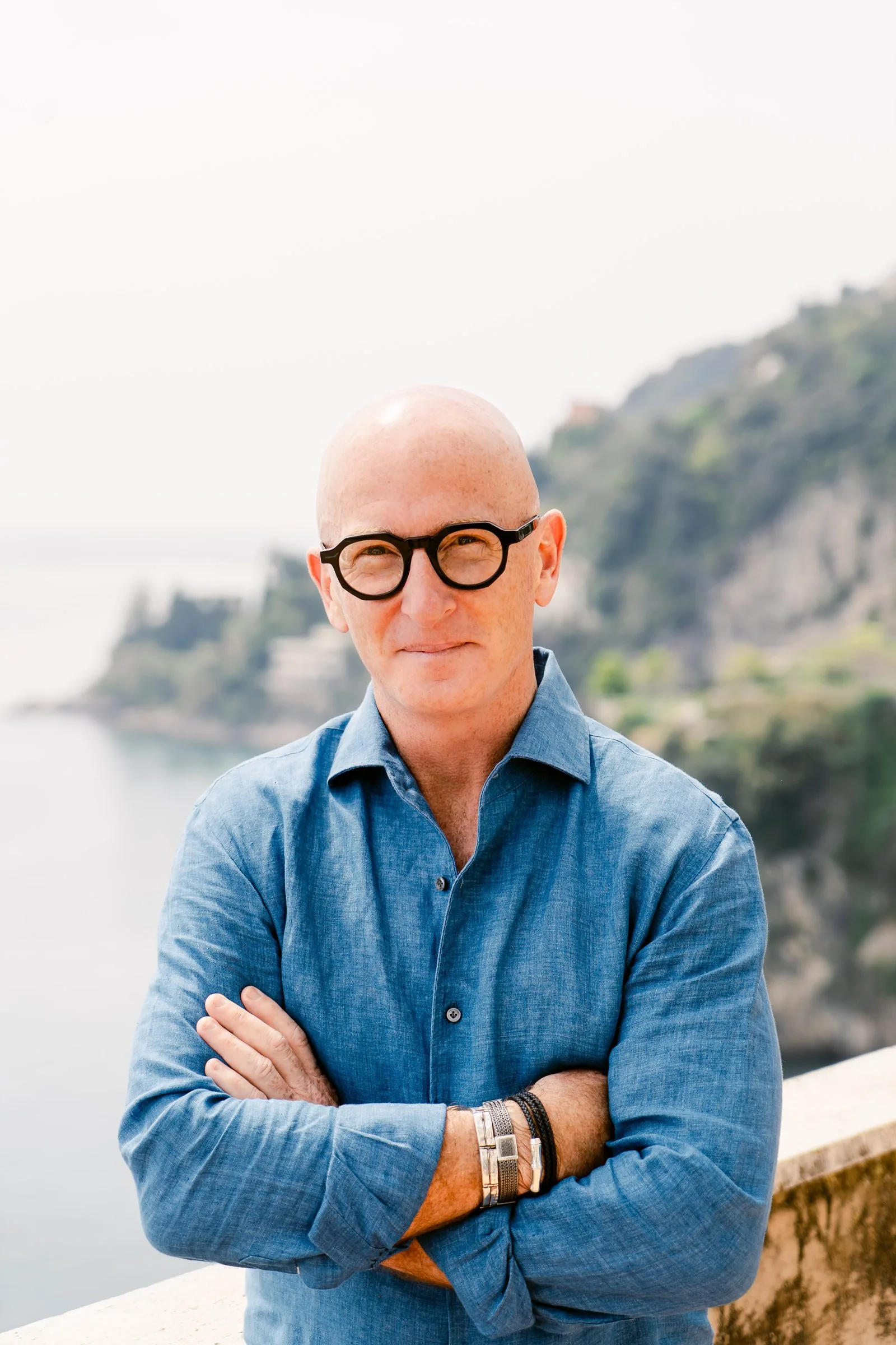 Errol Damelin, founder of Dust Road Ventures, photographed in coastal linen, golden hour.